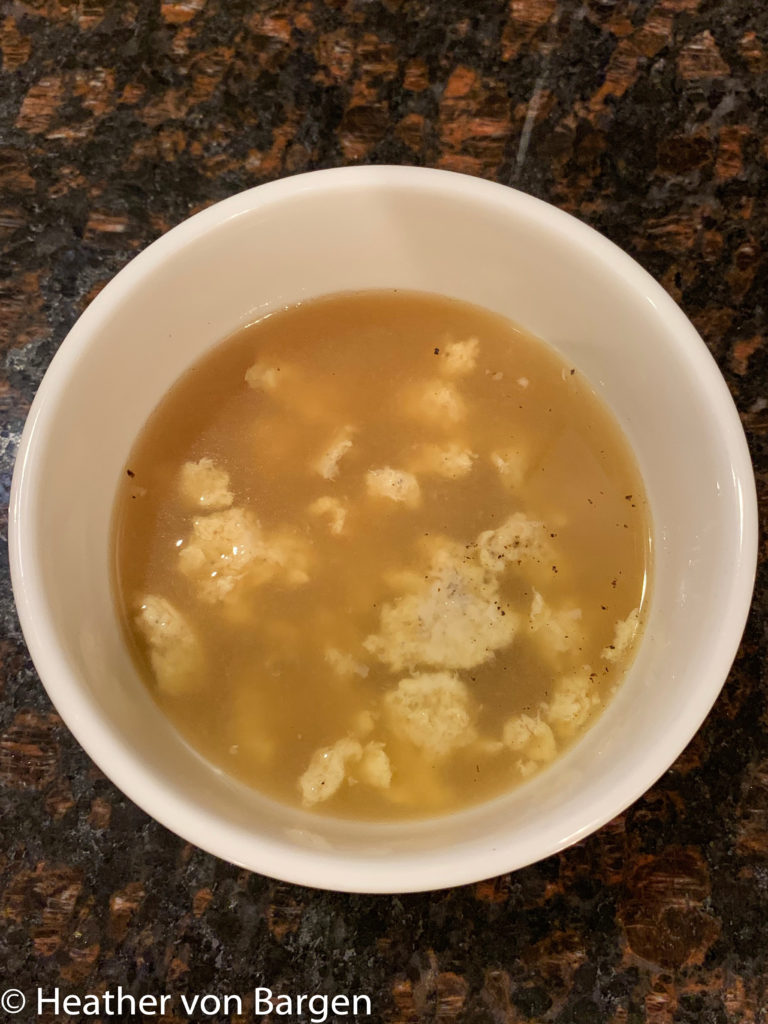Stracciatella soup ready to serve